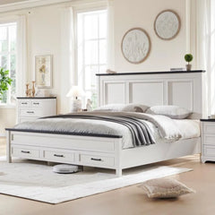 White bedroom with a bed, nightstands, and decor