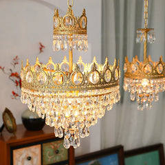 Close-up of a French crystal chandelier showcasing the intricate details of the crown design and sparkling crystals. D