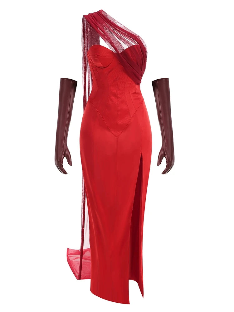 Red evening gown with sheer overlay and long gloves on a white background