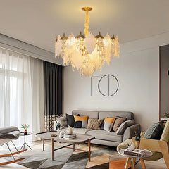 Modern blade chandelier with crystal accents and LED lighting, illuminating a stylish Living room. Golden Atelier 3