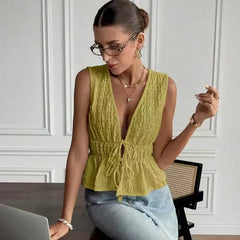 Yellow V-neck lace-up peplum top