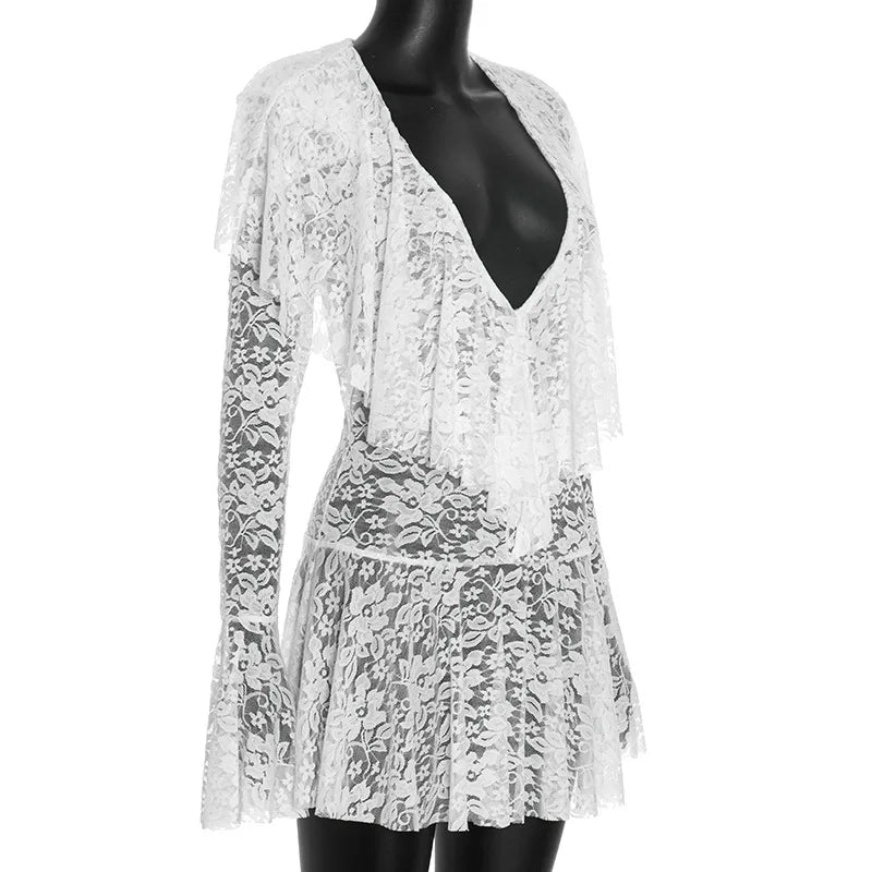Lace dress on a mannequin against a white background