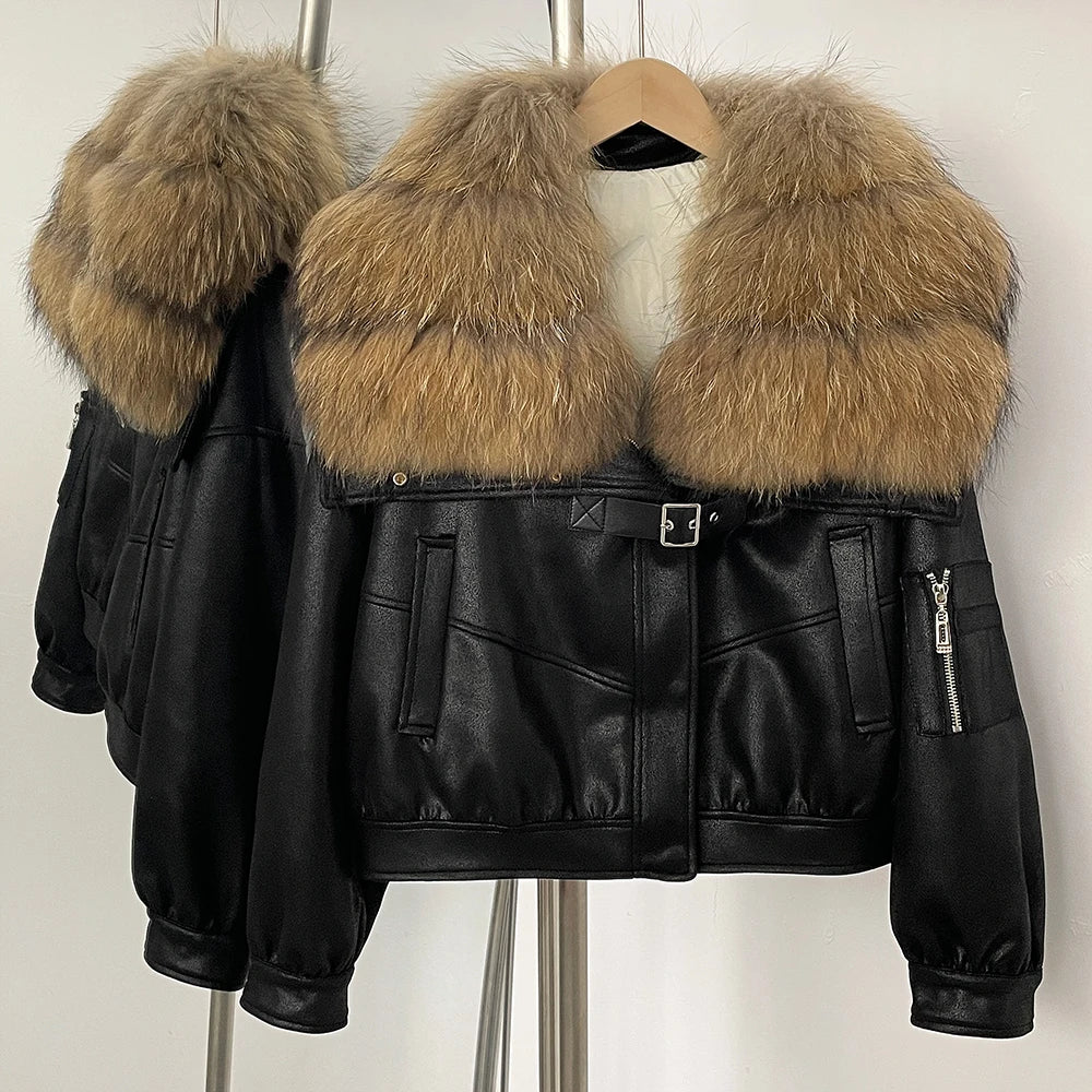 Black leather jacket with fur hood on a mannequin against a white background