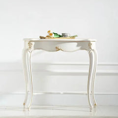 White side table with decorative elements on a white background