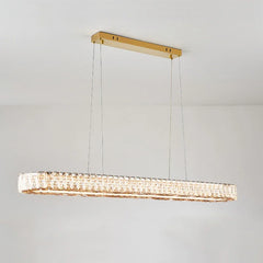 Modern rectangular pendant light with gold frame on a gray background