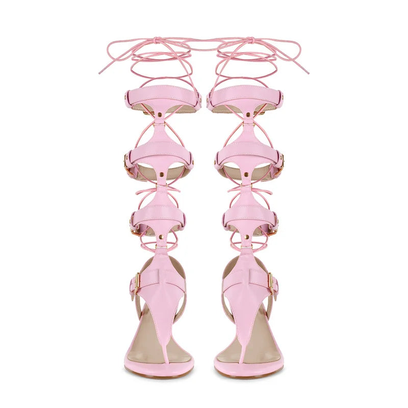 Pair of pink lace-up gladiator kitten heel sandals