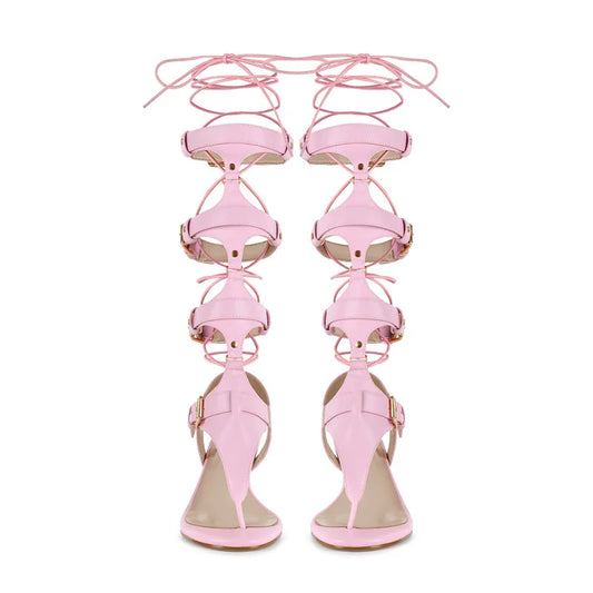 Pair of pink lace-up gladiator kitten heel sandals
