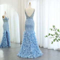 Mannequin displaying A glamorous blue mermaid evening gown with delicate feather accents and a V-neckline. Golden Atelier 3