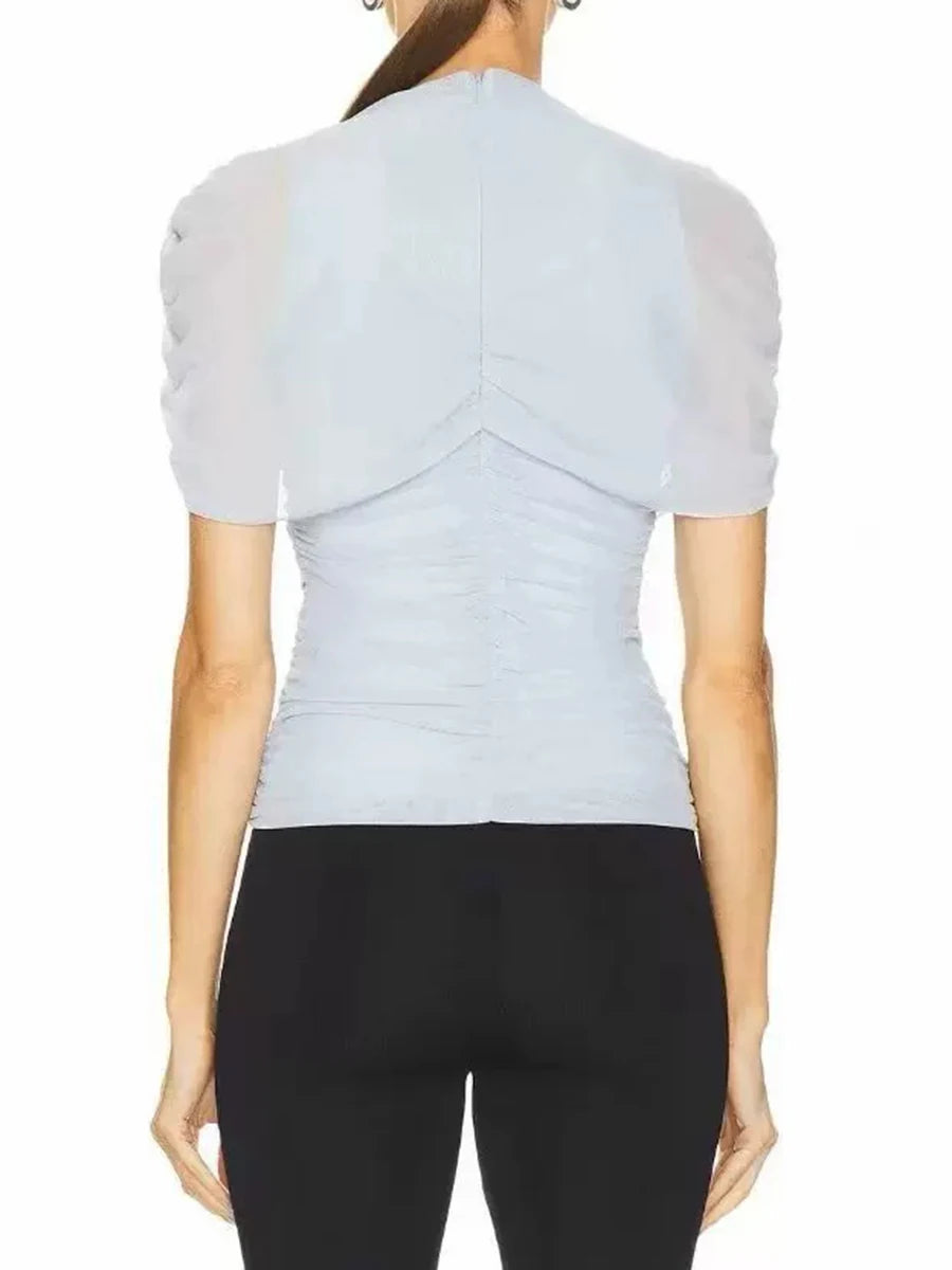 Back view of draped mock neck short sleeve top