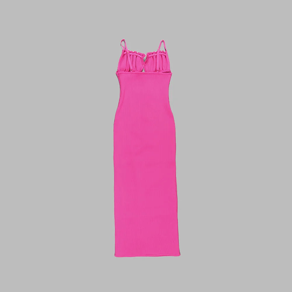 Pink dress with thin straps on a gray background