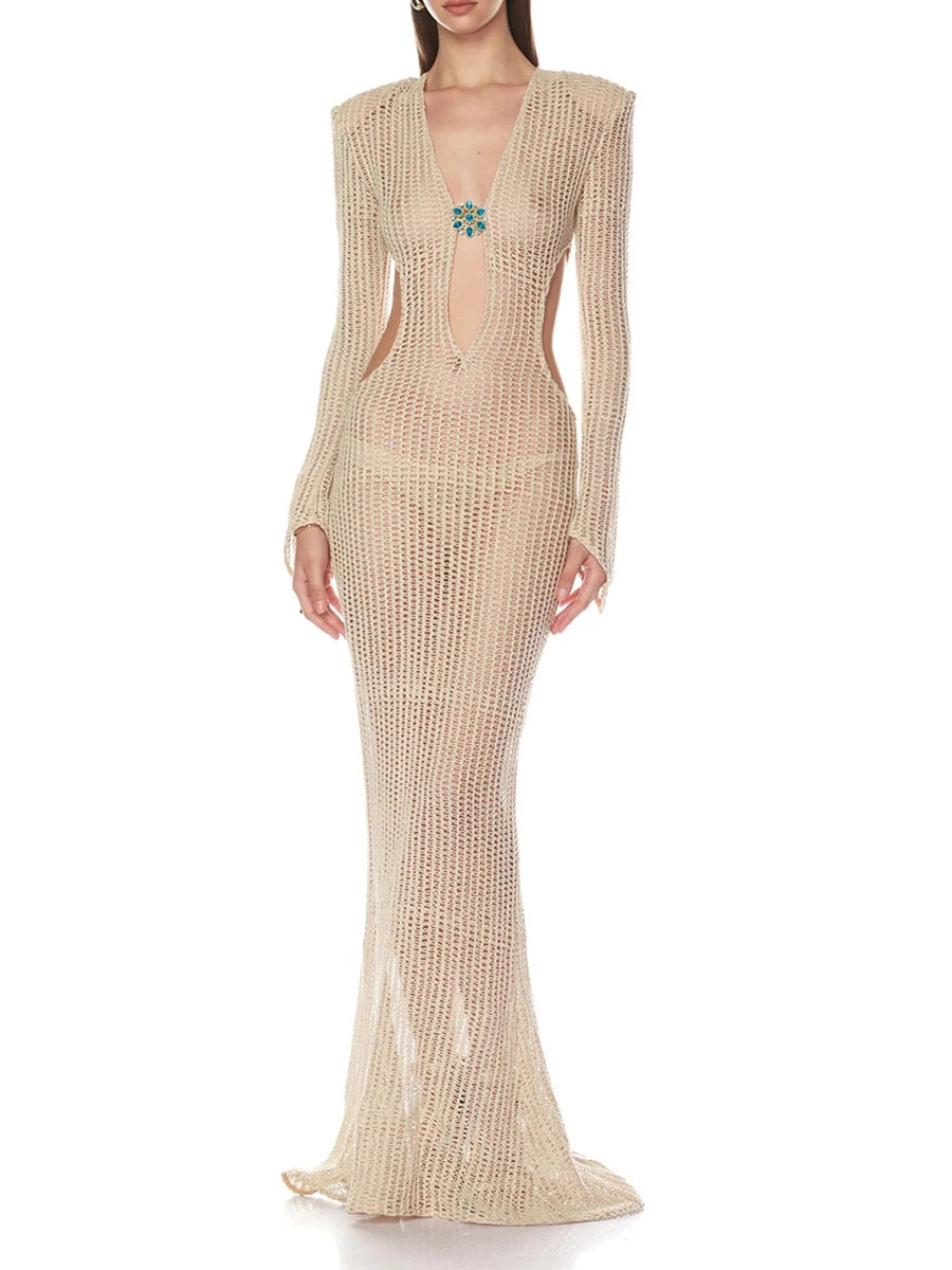 Beige evening gown with cut-out design on a white background