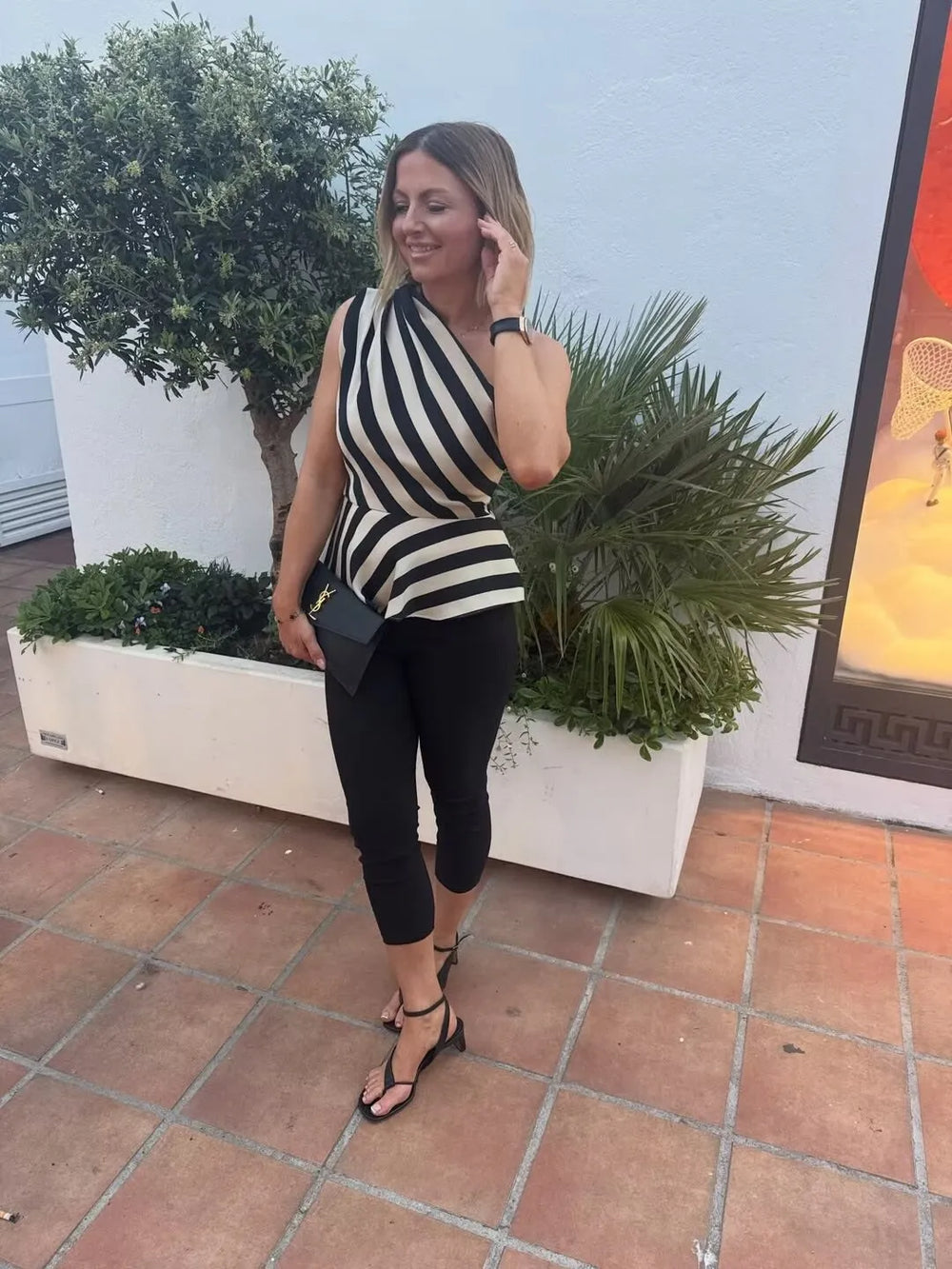 Striped one shoulder asymmetric peplum top styled
