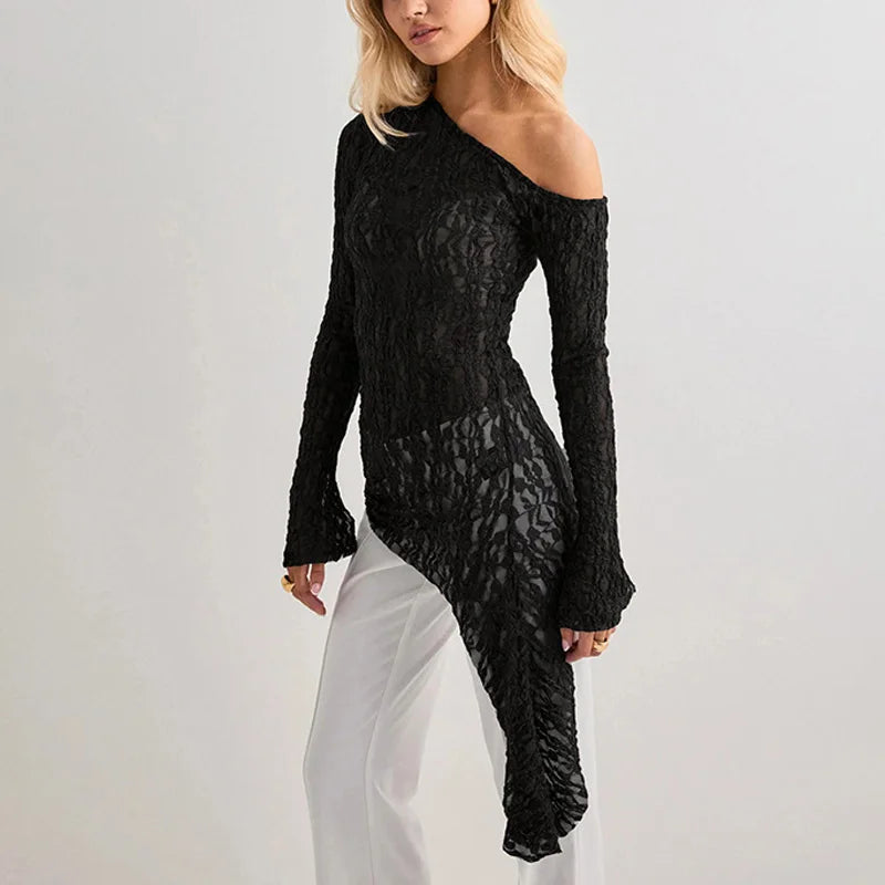 Black lace dress with long sleeves on a plain background