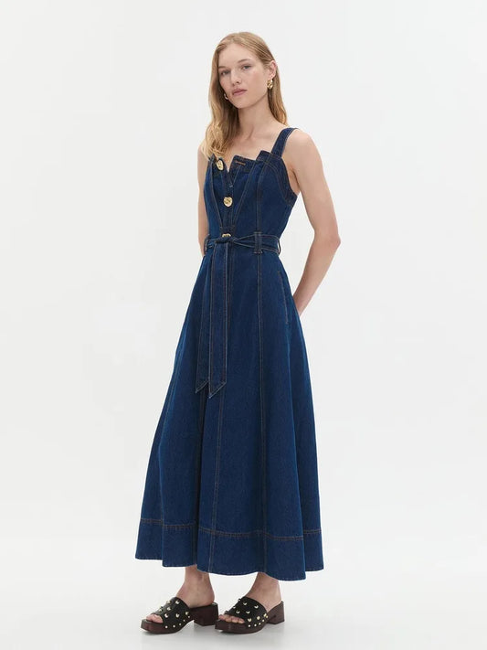 Side view of a denim midi dress with button front