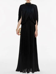 Black evening gown with draped neckline on a white background