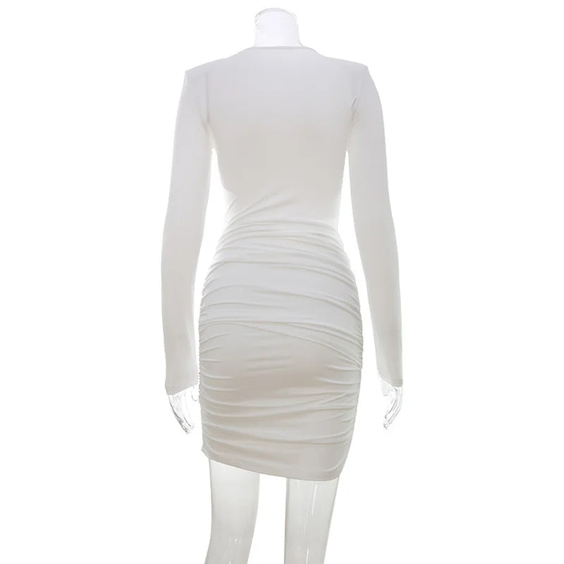 White long-sleeve dress on a mannequin against a white background
