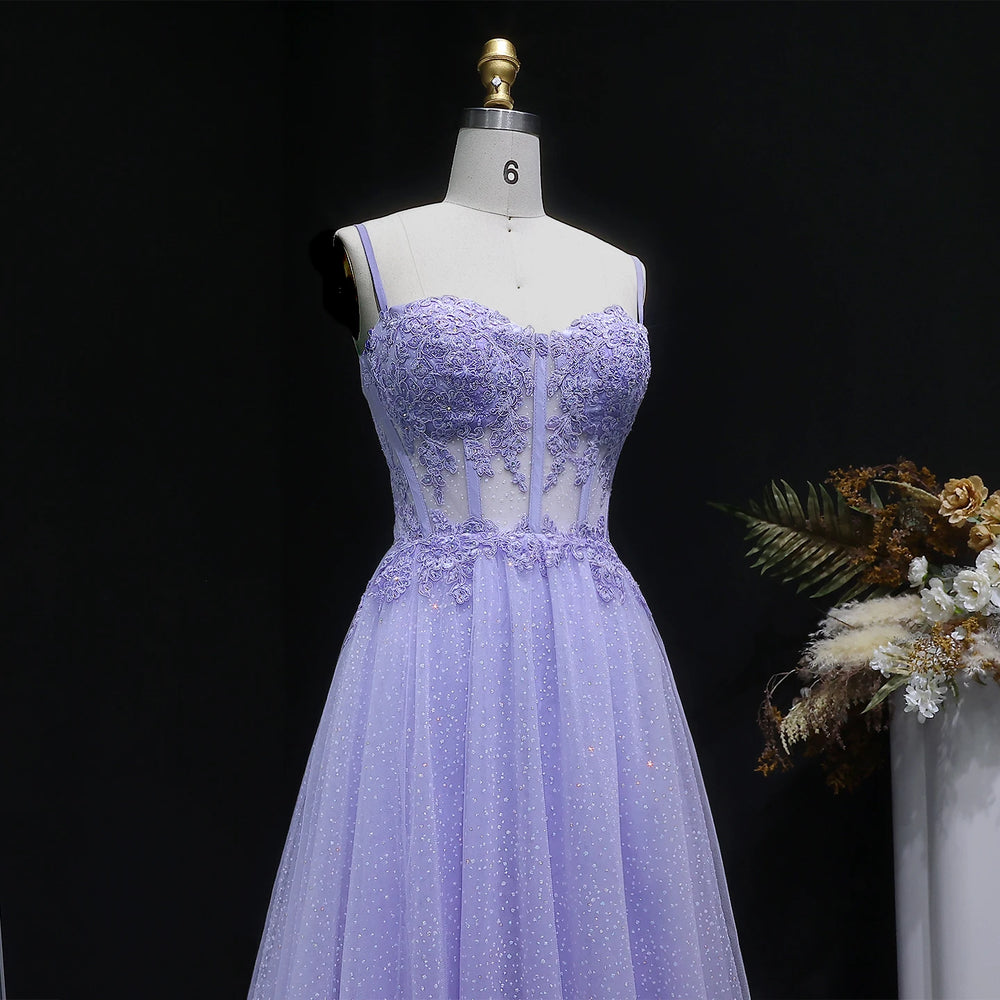Lavender evening gown on a mannequin with a dark background