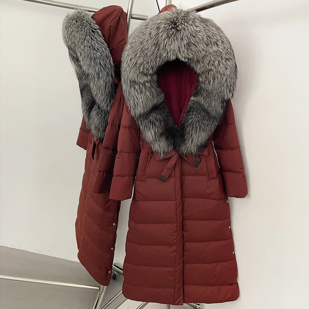 Red puffer coat with gray fur collar on a white background