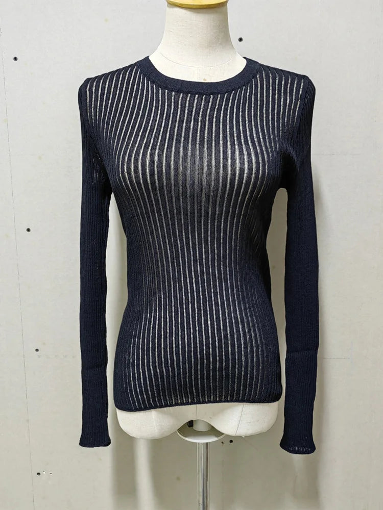 Navy ribbed sweater on a mannequin against a white background