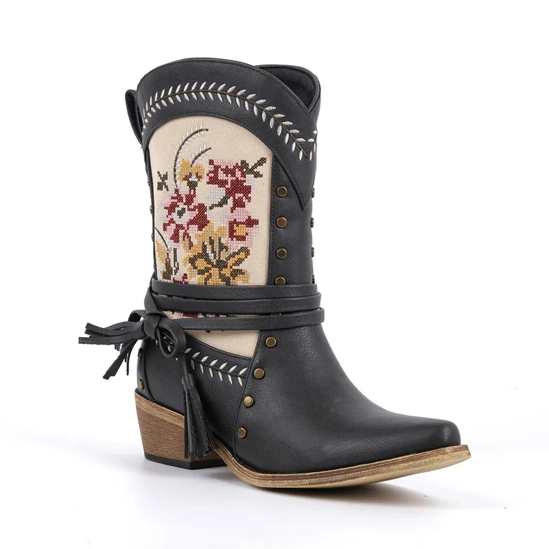 Black embroidered western ankle boots with floral detailing and wrap strap.