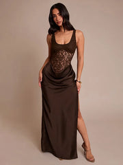 Woman wearing a brown lace bodysuit with a long skirt on a beige background
