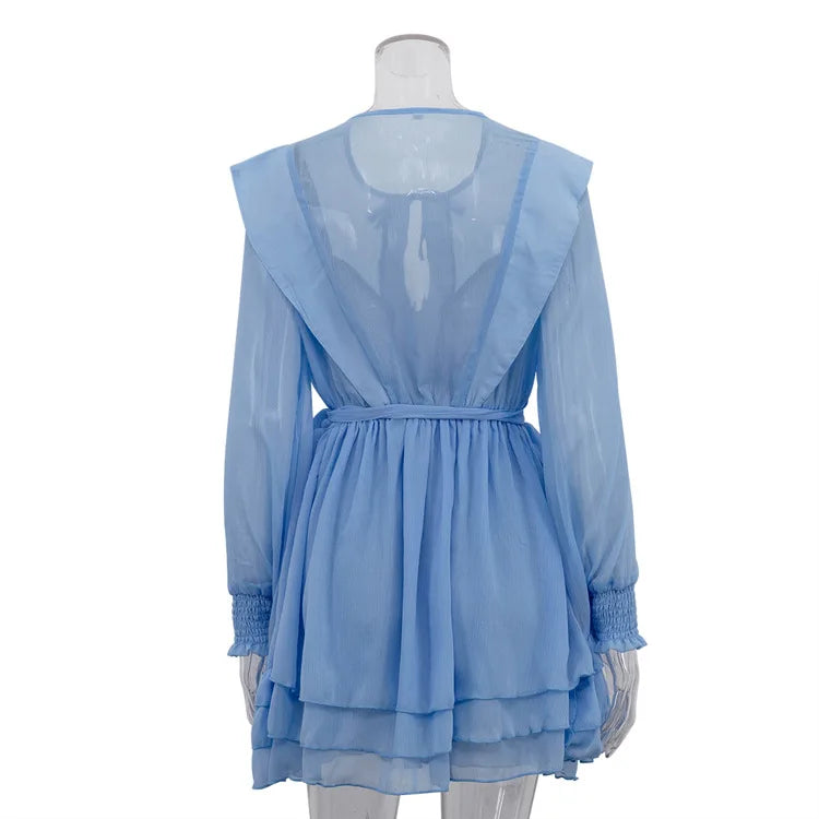 Blue dress on a mannequin against a white background