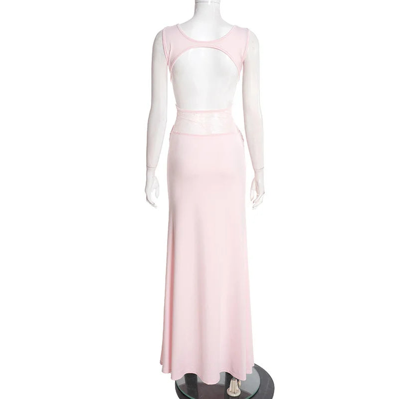 Mannequin wearing a light pink dress on a white background