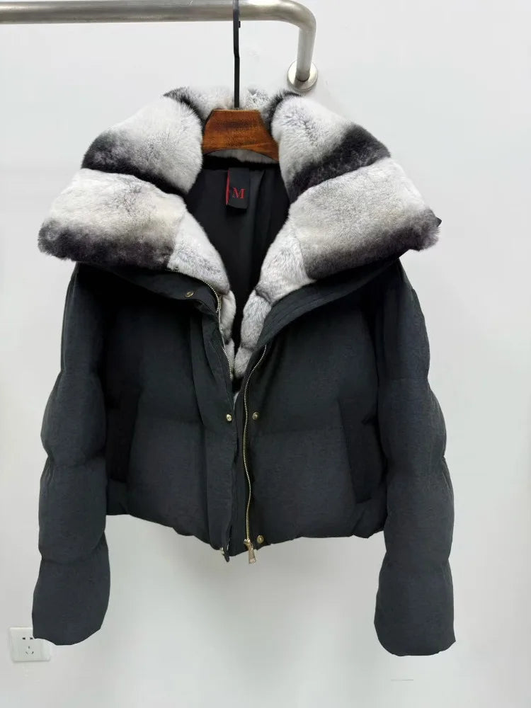 Black puffer jacket with fur-lined hood 