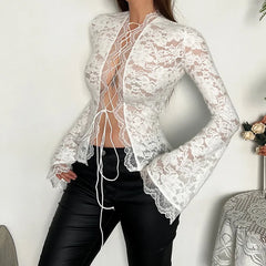 Women's lace top with a bandage design and long sleeves.