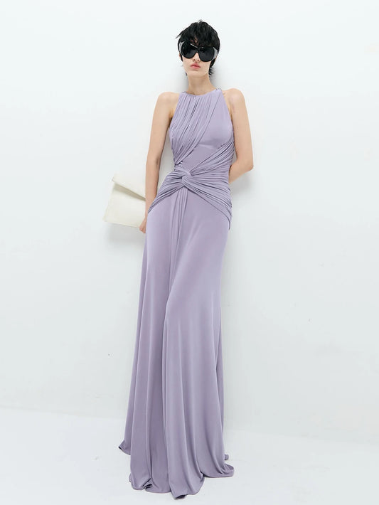 Draped halter neck maxi dress with sunglasses