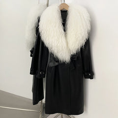 Long black faux leather belted coat with a fluffy white fur collar.