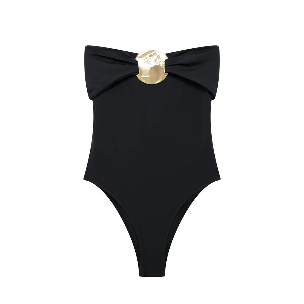 Black swimsuit with a gold bow on a white background