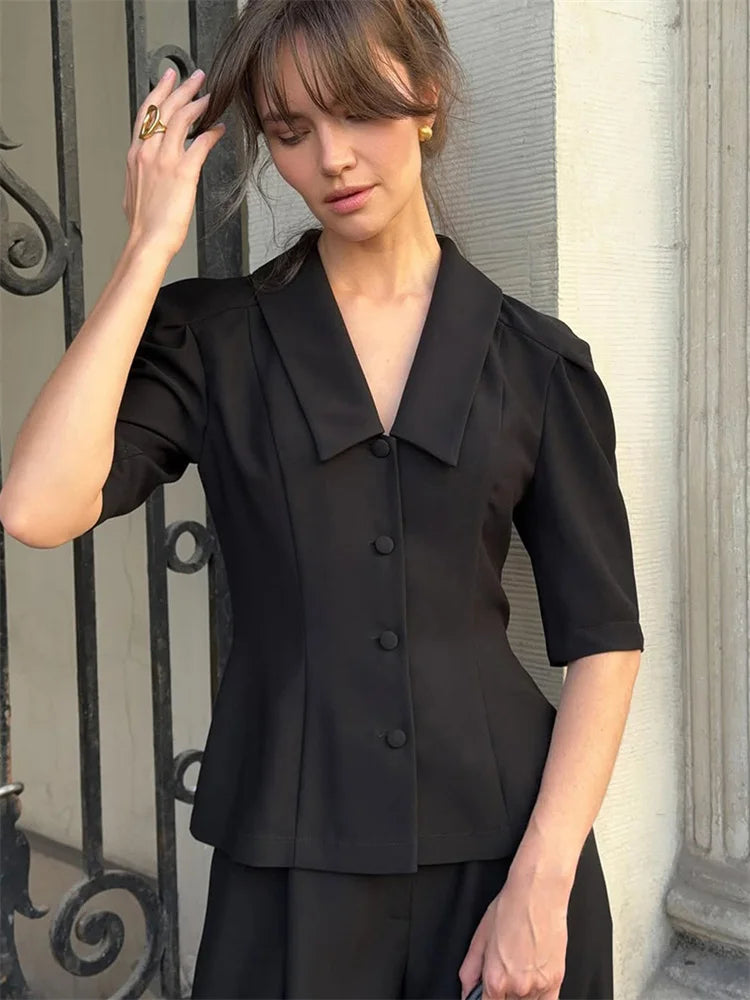 V-neck half-sleeve shirt styled with matching high-waist trousers