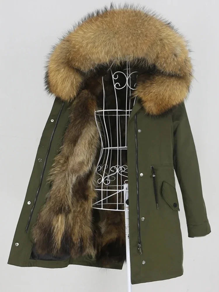 Green parka coat with fur hood on a mannequin against a white background