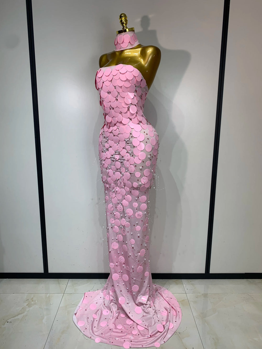 Strapless sequined form-fitting floor-length gown