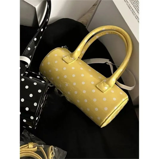 Yellow polka dot cylinder bag