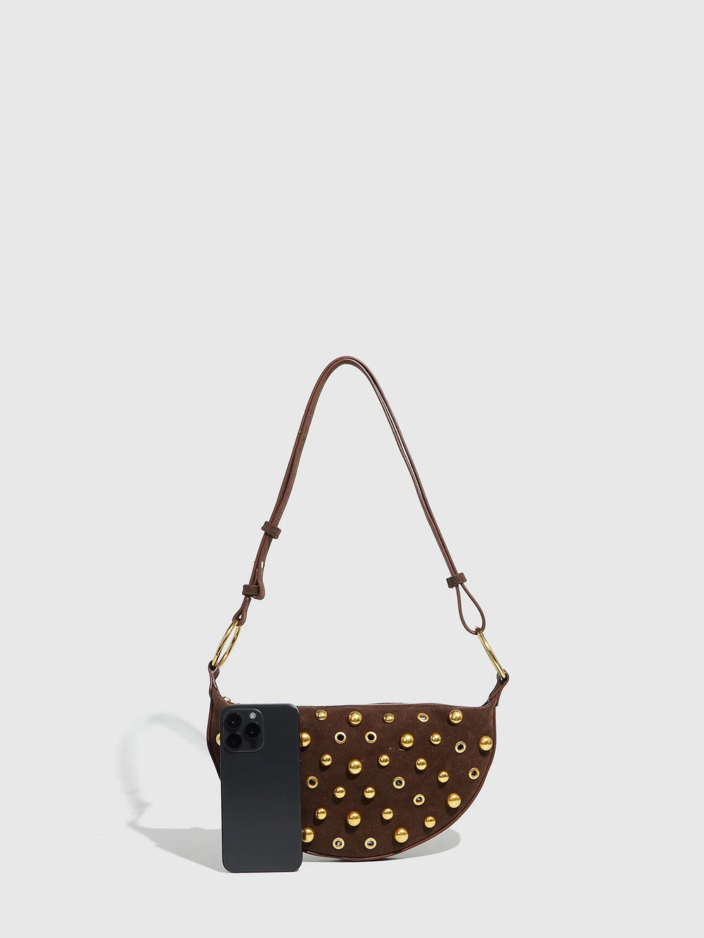Brown handbag with gold studs on a white background