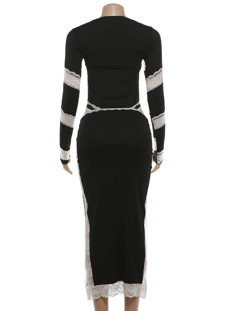 Black dress with white lace details on a white background