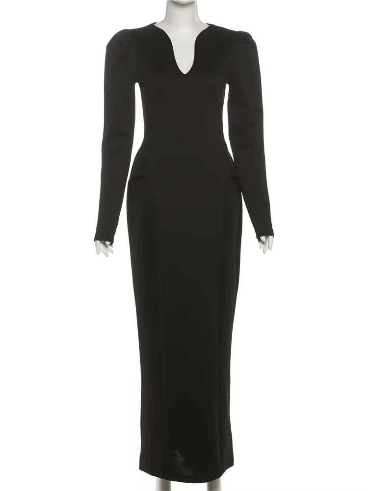 Black dress on a mannequin against a white background