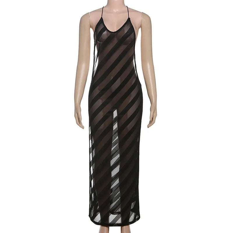 Black and white striped dress on a mannequin against a white background