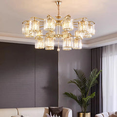 Modern crystal chandelier with cascading crystals, illuminating a luxurious living room. Golden Atelier 3