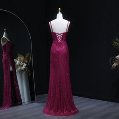 Pink evening gown on a mannequin against a dark background