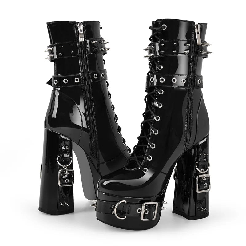 Close-up of spiked platform ankle boots