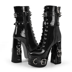Close-up of spiked platform ankle boots