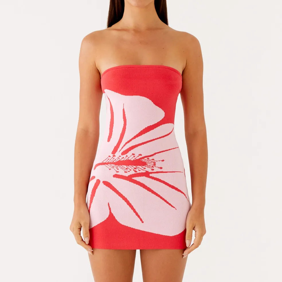 Red strapless dress with floral design on a white background
