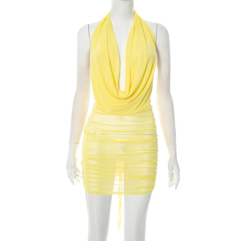Yellow dress on a mannequin against a white background