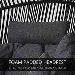 Foam padded headrest with text on a black and white striped background