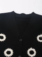 Women's embroidered cardigan with long sleeves.