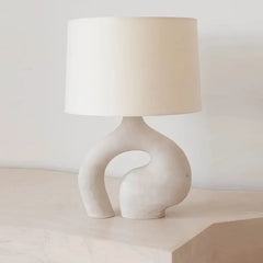  Modern fabric table lamp with a minimalist Nordic design, casting a warm glow Golden Atelier 4