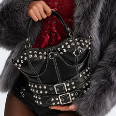 Black studded buckled corset bag styled with fashion